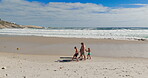Kids, parents and walking with love on beach for summer vacation, tropical journey and bonding together. Family, children and playful on ocean sand with holiday fun, calm morning and travel adventure