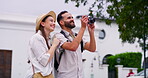Photographer, couple and camera for adventure, holiday or journey with city, street or town sightseeing. Travel, man and woman with pictures for happy memory, social media and vacation together