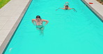 Tropical,  or couple swimming in pool for holiday, summer vacation or weekend break in home. B backyard, relax or people in water with care or paradise for travel, hotel or honeymoon in Australia