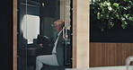 Laptop, business man and office pod for privacy, concentration or productivity boost. Soundproof booth, matutre manager or open door of focus space for noise reduction or distraction on computer