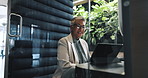 Video call, office and business woman on laptop in cubicle for privacy in meeting, discussion and virtual chat. Corporate, workspace pod and person on computer for talking, communication and webinar