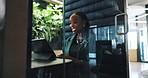 Video call, office and business black woman on laptop in cubicle for private meeting, discussion or virtual chat. Corporate, workspace pod and person on computer for talking, communication or webinar