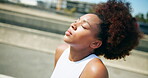 Active, woman and relax for fitness in city for muscle relief, exercise break and recovery of training. African, female person and rest with neck massage, sports workout and warm up prep for activity