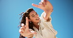 Hand frame, smile and selfie with face of woman in nature for perspective, photography and shooting. Profile picture, happy and low angle with person on blue sky background for memory and post