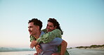 Sea, piggyback and couple on vacation, travel and exploration in nature for romance, people and together. Outdoor, tourist and playful on date at beach, man and woman in relationship on vacation