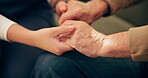Empathy, senior patient and caregiver with holding hands for wellness, trust and support for illness. Closeup, old person and nurse with kindness, elderly care and console by above in retirement home