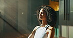Yoga, meditation and woman with relax in home for holistic wellness, mindfulness practice or peaceful. Calm, african girl and lotus pose on floor for spiritual healing, stress relief or mental health