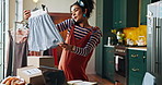 Woman, clothes or phone call for delivery, courier service or logistics with ecommerce inventory. Fashion designer, order or seller talking with mobile or stock for customer support, trade or sales