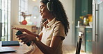 Woman, music and dancing at laptop for remote work, good mood and energy in morning. Freelancer, tech and headphones in home with favorite playlist, streaming audio or excited for new job opportunity