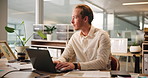 Accounting, thinking and man on laptop in office for bookkeeping, research or investment. Finance report, solution or serious accountant in workplace for audit review, profit growth or tax compliance