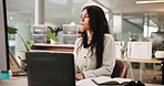 Computer, thinking and typing with woman in office for accounting or bookkeeping schedule. Finance, planning and research with accountant at desk in workplace for audit or tax compliance and report