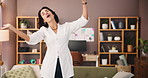 Mature, woman and happy dance in house living room with music, freedom and motion for energy. Break, relax or female person in lounge listening to audio with smile, song and body movement in home