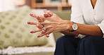 Anxiety, stress and hands of woman on sofa for psychology, mental heath and counseling session. Nervous, fear and depression with closeup of person in therapist office for mindset, help or evaluation