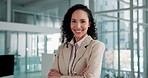 Office, crossed arms and face of business woman for financial career, ambition and confidence. Professional, corporate and portrait of person for finance advisor, investment agency and consultant