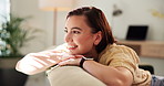 Girl, happy and thinking of memory on sofa with nostalgia, daydreaming and reflection in home. Peaceful, woman and smile in living room with weekend break, inspiration or planning decision with relax