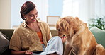 Woman, dog or relax on couch with treats, feeding and phone for pet training tips in home. Girl, support animal or Labrador in living room with obedience lesson, reward or happy for trust development