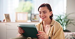 Home, woman and smile with tablet for website, choose movie and connection for subscription on sofa. House, female person and relax with digital for streaming entertainment, select film and happiness