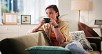 Couch, woman and relax with coffee to drink, comfortable and happiness with espresso at home. House, female person and chilling in morning for warm cappuccino, caffeine and thinking in living room