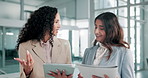 Women, tablet and discussion with report at office, planning or review stats with advice at insurance agency. People, partner and results for risk management with application for feedback at company