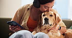 Kiss, dog and woman with phone in home for pet insurance, social media post or adoption. Headphones, bonding or person with labrador, love or mobile app for foster care, animal rescue or subscription