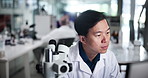 Microscope, man and scientist on computer for research, development and experiment. Medical, science and doctor with biotechnology for pharma exam, microbiology and check test results in laboratory