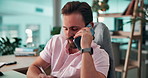 Computer, phone call and web development with man coding software in office for launch or testing. Design, programming and writing with developer employee at desk in workplace for infrastructure code