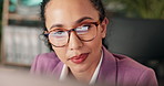 Computer, glasses and reading with business woman at desk in office for administration task. Finance, report and research with accounting employee in workplace to review financial information