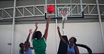 Basketball, score and game with black people on court for sports, challenge and competition. Shooting, training and fitness with women in gym practice for athlete, workout and energy together