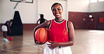 Basketball, face and happy player with ball on court for competition practice, workout and ready for match. Sports, fitness and girl with confidence for game preparation, tournament or training pride