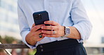 Phone, hands and businessman in city for email, communication or contact with investment client. Cellphone, closeup and financial manager typing for social networking online with technology in town.