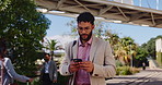 Business, walking and man in city, smartphone and message to contact, urban town and texting. Person, employee and mobile user in street, cellphone and social media with connection and online reading