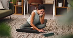 Home, woman and online with tablet for exercise, streaming class and connection for fitness website. Floor, mature person and technology with typing for digital video, virtual workout and application