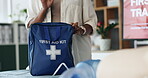 Hands, woman and bag for first aid training for rescue safety, demonstration lesson and advice. Person, explaining and injury kit for medical emergency, learning procedure and process for life saving