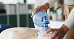 Ventilator, cpr and hands of woman with dummy for demonstration, tutorial and lesson for first aid. Healthcare, safety and person with respiratory mask for paramedic course, learning or medical class