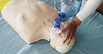 Mask, cpr and hands of person with dummy for demonstration, tutorial and lesson for first aid. Healthcare, above and woman with respiratory ventilator for paramedic course, learning or medical class