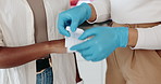 Paramedic, hands or first aid with bandage for injury, training or emergency service at office. Closeup, medical worker or strap with cotton, patient or accident for bruise, wound or healthcare