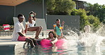 Bonding, drinking and splash with friends in swimming pool together for holiday or vacation. Party, summer and water with group of people outdoor at hotel, lodge or resort for weekend getaway