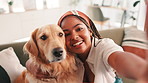 African woman, dog and selfie on sofa in home with smile, hug and care with post on social media. Girl, influencer and golden retriever with photography, memory and live streaming on web in Nigeria