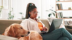 Online, freelancer and woman with pet, laptop or creative for web design in living room and animal. Remote work, calm and black person with dog in lounge, graphic designer or tech for project in home
