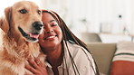 Hug, home and black woman with dog on sofa for bonding, relax and playing together in living room. Pet owner, happy and African person with Golden Retriever embrace for affection, trust and love