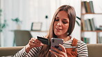 Online shopping, payment and woman with debit card, smartphone and browsing on website for purchase. Home, customer and person with credit for ecommerce, smile and happy for digital product on app