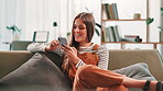 Happy, woman and relax with phone at house for communication, social media and reading blog. Female person, mobile app and texting for feedback, planning weekend and message update with notification