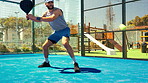 Sports, tennis court and man with padel for game, match and competition outdoors. Fitness, athlete and person with racket for training, exercise and workout for tournament, challenge and practice