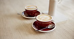 Coffee, cup and double espresso in cafe for drink, caffeine beverage and cappuccino. Foam cream, aesthetic or tea mug with warm liquid for restaurant, shop and diner for order, small business or date
