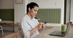 Woman, laptop and phone for remote work at cafe with typing, review or app for project management at diner. Person, virtual assistant and pc for admin, contact or feedback for proposal at coffee shop