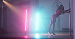 Butt, pole dancer and woman in nightclub with music, burlesque or performance with neon lights. Erotic dancing, girl and artist moving for sensual art, sexy and shake with exotic body in lingerie