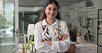 Fashion designer, crossed arms and face of woman in office with confidence, pride and smile. Startup business, professional and portrait of happy person for opportunity, creative career and job