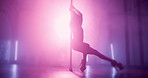Pole, dancing and woman in club on a stage for choreography, creativity and balance for concert. Dark, silhouette and female exotic dancer with entertainment by lights for performance at VIP party.