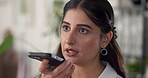Woman, voice note and planning in office with negotiation for project management at web design company. Person, smartphone and smile with thinking, review and feedback discussion at creative agency
