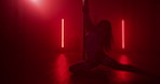 Exotic, dancer and performance in club, flexible and dancing with balance for show, talent and artist. Night, silhouette and person with elegance for event, pole and performer with outfit for routine